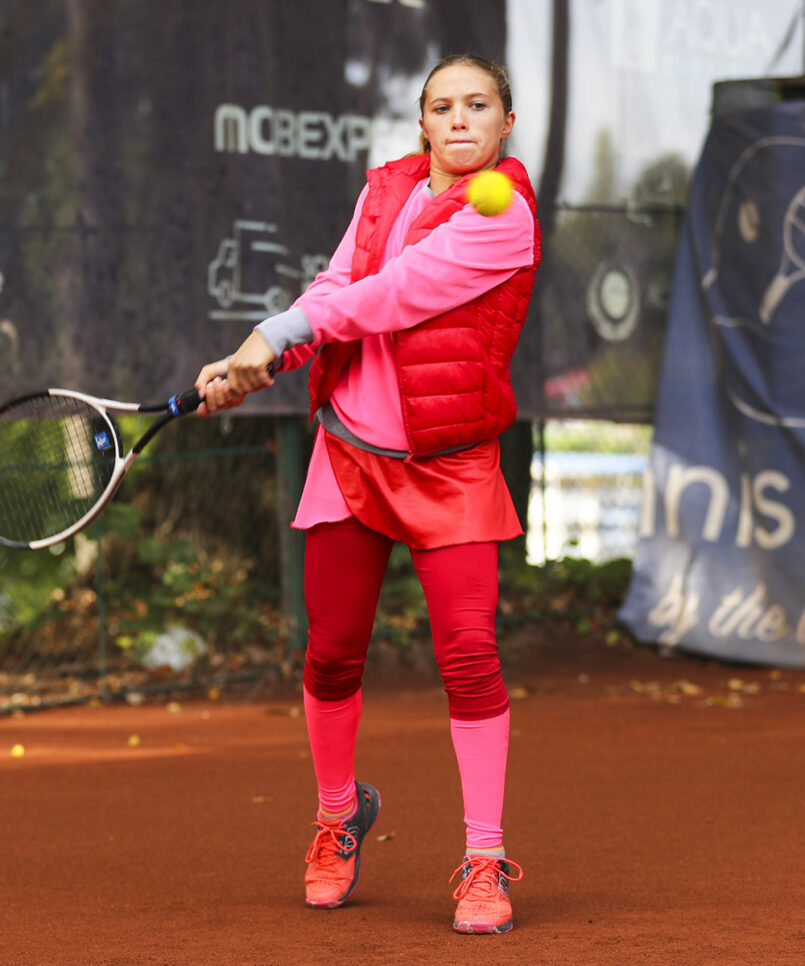 red puffa gilet for girls tennis by zoe alexander